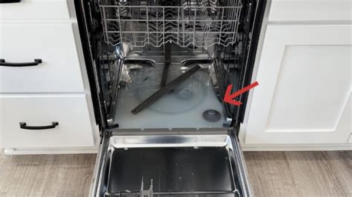 Is it normal for a new dishwasher to have water in the bottom